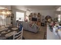 Cozy living room with hardwood floors and a dining area at 9550 E Thunderbird Road -- # 141, Scottsdale, AZ 85260