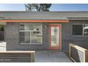 Close-up of the front door and facade, showcasing the modern design elements of the home at 1432 W 7Th St, Tempe, AZ 85281