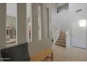Bright foyer with open staircase and decorative accents, creating a welcoming atmosphere at 1770 S Sabino Dr, Gilbert, AZ 85295