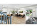 Spacious living room with hardwood floors, modern lighting, and comfortable seating areas for entertaining at 4216 N 42Nd St, Phoenix, AZ 85018