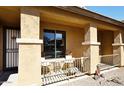 Inviting covered porch with seating area perfect for relaxing outdoors at 45558 W Mountain View Rd, Maricopa, AZ 85139