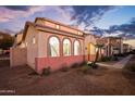 Charming two-story home with arched windows and a well-maintained exterior at 5110 W Fulton St, Phoenix, AZ 85043