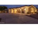 Spacious three-car garage with large driveway offering ample parking and convenient access to the home at 9612 W Mariposa Grande --, Peoria, AZ 85383