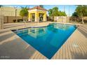 Inviting community pool with shade gazebo and plenty of lounge seating at 1950 N Center St # 111, Mesa, AZ 85201