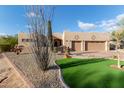 Beautiful single-story home showcasing desert landscaping and a spacious three-car garage at 20212 E Appaloosa Dr, Queen Creek, AZ 85142