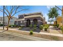 Charming two-story home with a welcoming arched entryway and well-maintained landscaping at 2983 E Harrison St, Gilbert, AZ 85295