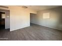 Spacious living room with tile floors and neutral paint color at 4221 N 33Rd Dr, Phoenix, AZ 85017