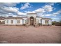 Attractive single-story home with a meticulously kept yard at 529 S Val Vista Rd, Apache Junction, AZ 85119