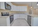 Close-up of the kitchen with stainless steel appliances and granite countertops at 4130 N Del Monte Dr, Eloy, AZ 85131