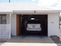 Spacious garage with interior access to the home at 10607 W El Rancho Dr, Sun City, AZ 85351