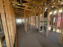 Interior view showcasing the new home's framework and open-concept design, waiting for customization at 4276 E Brook Lynn Pl, San Tan Valley, AZ 85140