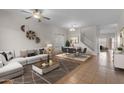 Cozy living room and dining area with tile flooring and modern decor at 28793 N Spur Dr, San Tan Valley, AZ 85143