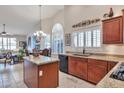 Kitchen with granite countertops, stainless steel appliances, and a center island at 3032 N 160Th Ave, Goodyear, AZ 85395