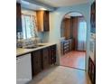 View of the kitchen featuring a stainless steel sink and ample cabinet space at 3104 E Broadway Rd # 268, Mesa, AZ 85204