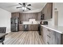 Modern kitchen with stainless steel appliances and wood floors at 4026 N 81St St, Scottsdale, AZ 85251