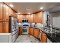 This kitchen showcases stainless steel appliances and sleek countertops, perfect for culinary enthusiasts at 5350 E Deer Valley Dr # 2236, Phoenix, AZ 85054