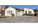 Attractive single-story home with desert landscaping and attached two car garage at 6915 S Sapphire Way, Chandler, AZ 85249