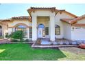 Charming home featuring a bright, open entrance and a meticulously maintained front yard at 819 W Harbor Dr, Gilbert, AZ 85233