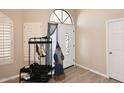 Inviting foyer with wood-look tile flooring and ample natural light, creating a warm welcome at 819 W Harbor Dr, Gilbert, AZ 85233