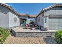 Inviting single-story home with a quaint front porch, low maintenance desert landscaping, and tile roof at 15352 W Via Manana --, Sun City West, AZ 85375