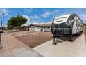 Well maintained home with neutral exterior paint, desert front yard landscaping at 3832 W Eva St, Phoenix, AZ 85051