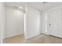 Clean entryway with light wood-look tile flooring and neutral walls at 5046 W Karl St, San Tan Valley, AZ 85144