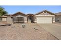 Beautiful single-Gathering home with desert landscaping, two-car garage, and a welcoming entrance at 1244 E Princeton Ave, Gilbert, AZ 85234