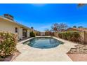 Backyard pool with a lounge area, perfect for outdoor entertaining and relaxation at 14426 N 52Nd Ave, Glendale, AZ 85306