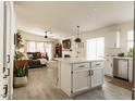 Modern kitchen with a center island and stainless steel appliances at 16634 N 33Rd Way, Phoenix, AZ 85032