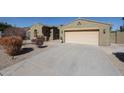 Charming home featuring a spacious two-car garage and well-maintained desert landscaping at 18178 W Desert View Ln, Goodyear, AZ 85338