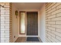 Covered front entry with a secure wrought iron door, providing both safety and curb appeal at 2512 N Central Dr, Chandler, AZ 85224