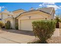 Charming single-story home featuring low-maintenance landscaping, two-car garage and neutral-toned stucco at 3357 W Barcelona Dr, Chandler, AZ 85226