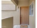 Charming front door with a welcoming mat that reads 