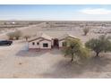 Single-story home featuring a desert landscape and xeriscaping at 6431 N 418Th Ave, Tonopah, AZ 85354