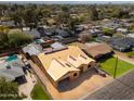 Aerial view of new home construction in an established neighborhood with mature landscaping and backyard swimming pools at 4115 E Windsor Ave, Phoenix, AZ 85008