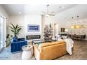 Inviting living room features modern decor, a fireplace, and an open concept design at 4115 E Windsor Ave, Phoenix, AZ 85008