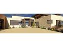 Home with modern design, desert landscaping, and well-lit front entrance at 8167 E Leaning Rock Rd # 193, Scottsdale, AZ 85266