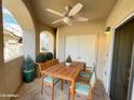 Covered patio featuring a ceiling fan and outdoor seating, perfect for enjoying the breeze at 10401 N 52Nd St # 124, Paradise Valley, AZ 85253