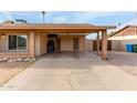 Single-story house with a covered driveway at 12402 N 36Th Dr, Phoenix, AZ 85029