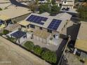 Aerial view of a home featuring solar panels, a gazebo, and an outdoor storage shed at 1391 E 12Th St, Casa Grande, AZ 85122