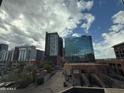 Expansive city view featuring skyscrapers, office buildings, and low rise brick buildings on a sunny day at 21 E 6Th St # 412, Tempe, AZ 85281