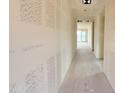 Unfinished hallway featuring drywall walls and ceilings awaiting finishing touches at 2401 E Spur Dr, San Tan Valley, AZ 85140