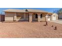 Single-story home featuring desert landscaping, with covered porch and red brick accent at 1022 W Watson Dr, Tempe, AZ 85283