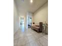 Inviting hallway with tiled floors and stylish decor at 18809 W Wilson St, Buckeye, AZ 85326