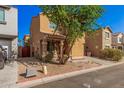 Quaint two-story home with a low-maintenance desert landscape featuring gravel and a small front porch at 335 S Travis --, Mesa, AZ 85208