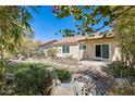 Private backyard featuring desert landscaping and patio space perfect for outdoor enjoyment at 11229 E Emelita Ave, Mesa, AZ 85208