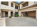 Attached garage with storage cabinets, and a water heater at 16800 E El Lago Blvd # 2062, Fountain Hills, AZ 85268