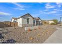 Inviting single-story home featuring desert landscaping for low-maintenance appeal at 2205 E Fallen Leaf Ln, Phoenix, AZ 85024