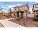 Well-kept home with a charming front yard and a cozy entryway at 3819 E Jasper Dr, Gilbert, AZ 85296