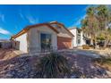 Well maintained single-story home with desert landscaping and a convenient two-car garage at 38226 N Kyle St, San Tan Valley, AZ 85140